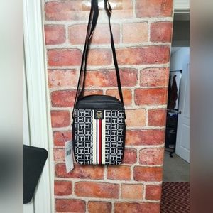 Tommy Hilfiger branded crossbody bag. NWT. Adj. Strap. Canvas/leather.